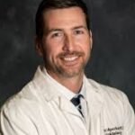 Dr. Eric E. Speckner