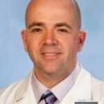 Dr. Eric T. Miller
